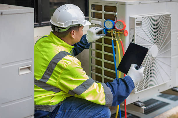 Professional Heat Pump Repair technician working in Rosedale, CA